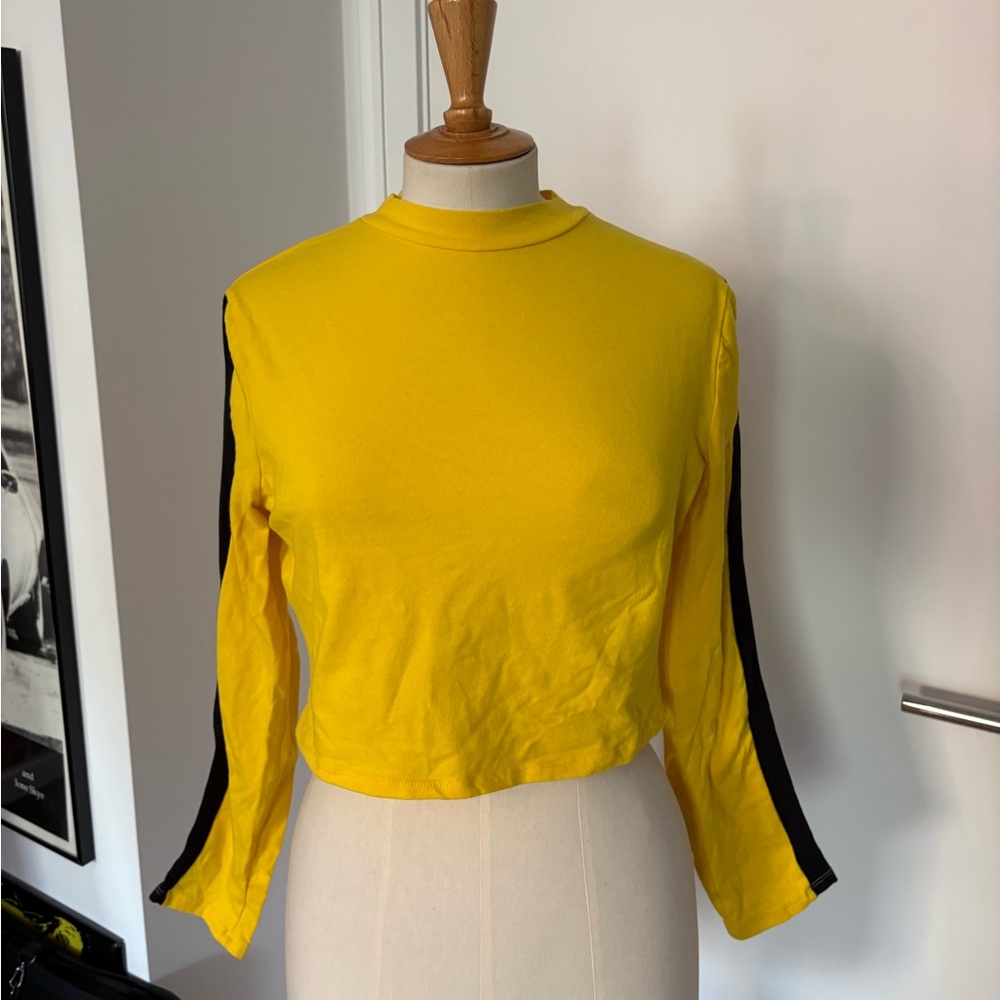 Dolls kill yellow long sleeve cropped top with black stripes. Size larger.